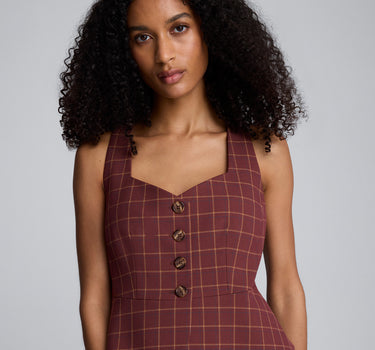 Chaleco peplum de corte curvo con cuatro botones para mujer