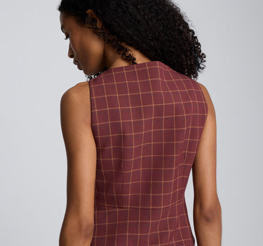 Chaleco peplum de corte curvo con cuatro botones para mujer