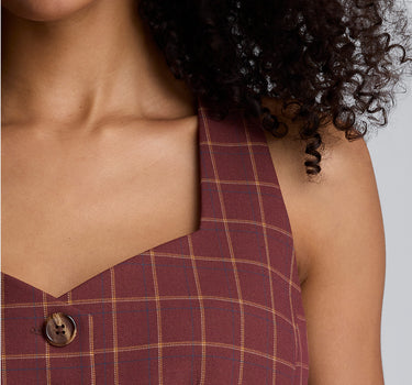 Chaleco peplum de corte curvo con cuatro botones para mujer