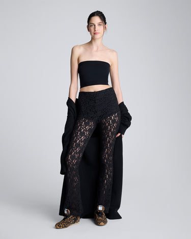 Pantalón acampanado con cintura elastica y short interno para mujer